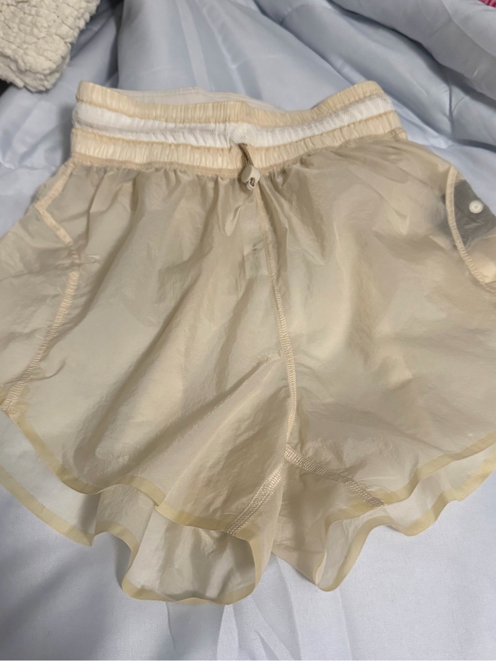 Lululemon Light Beige transparent Women's Lightweight Ruffle Hem Shorts